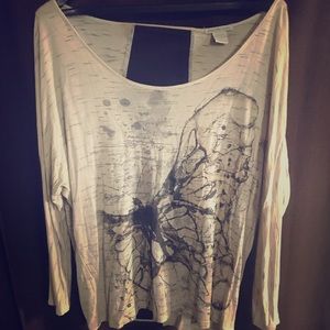 Butterfly, sheer back, long sleeve shirt.